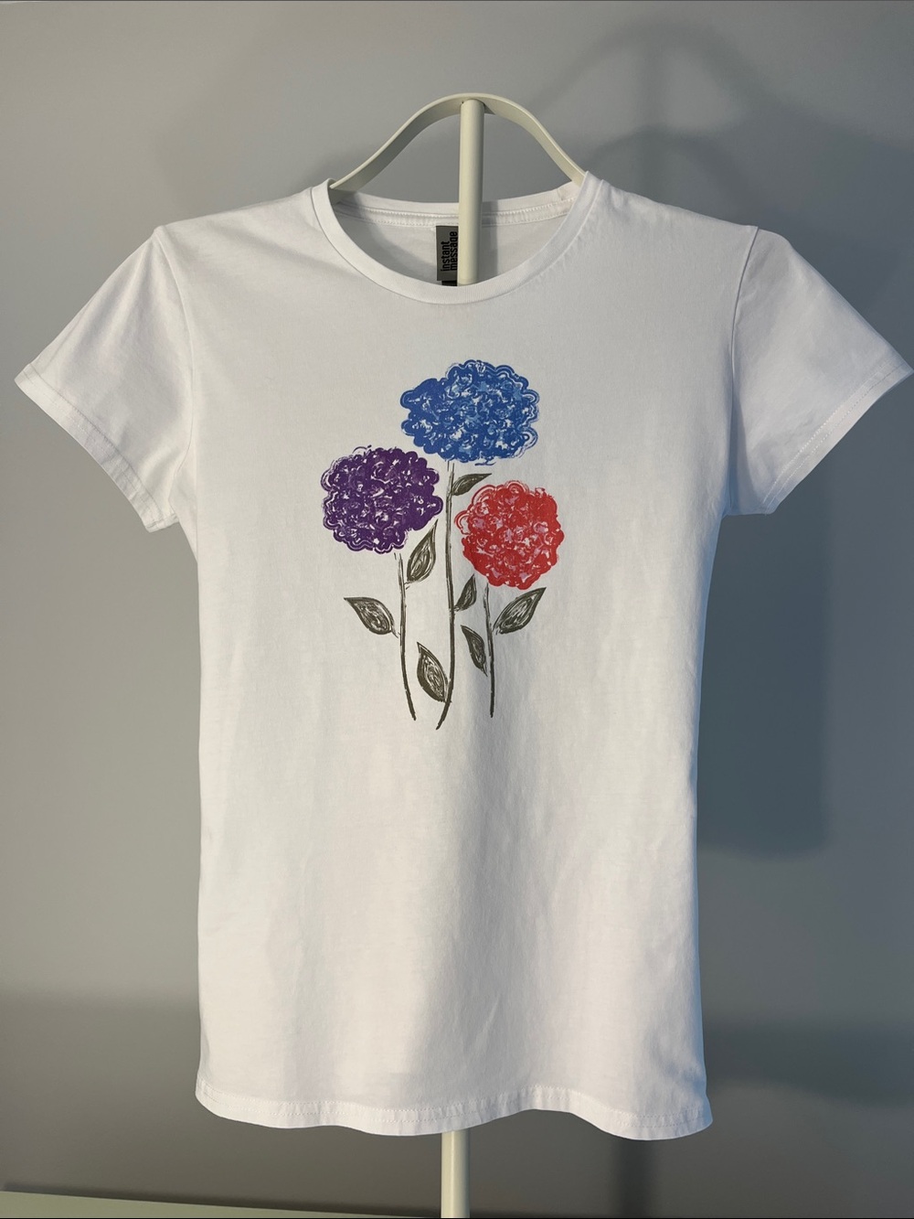 Women’s White Floral Graphic Tee with Red, Blue & Purple Blooms